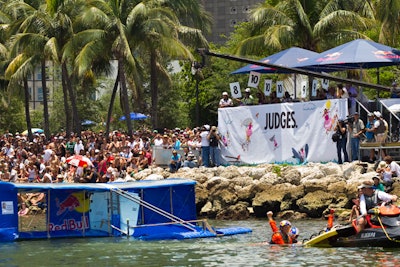 The seven judges held up score cards following each flight.