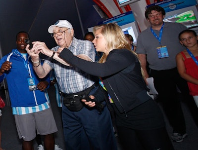 A big part of the marketing effort is to reach Wii consumers of all ages, including the 25 percent that are more than 55. The kickoff saw players like 80-year-old Tony Rotella (left) learn games alongside ambassador Shawn Johnson.