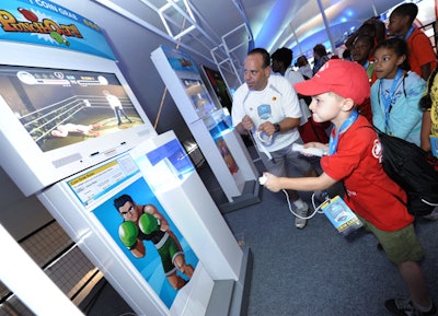 The upstairs section of the tent provided stations for less competitive play, allowing kids from the metropolitan area summer camps to try out the different Nintendo Wii games.