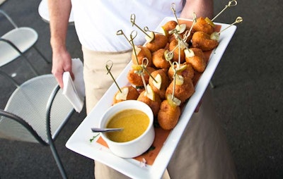 The evening's passed hors d'oeuvres included Kobe beef corn dogs.
