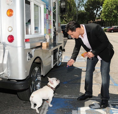 Mario Lopez stopped with his dog for a photo op at the truck.