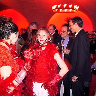 Cigarette girls at the Paint the Town Rouge party for Champagne Mumm's Cordon Rouge passed out--and smoked--red cigarettes.