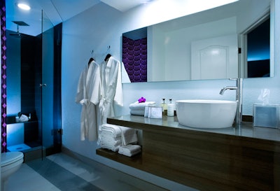 Bathrooms in the 150 suites have a sleek look.