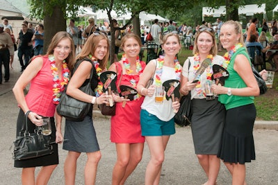 Local jazz radio station 105.9 handed out paper fans, which quickly became a prized commodity due to the extreme heat.