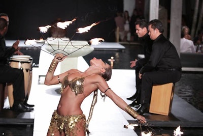 A fire dancer performed along with two percussionists during the Inca fashion show on July 16 as part of Funkshion Swim at the Setai.