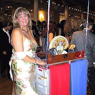 American Airlines flight attendant Maggie Yawger sold raffle tickets from an airplane cart at the Americans Are United fund-raiser for the Wings Foundation organized by flight attendants.