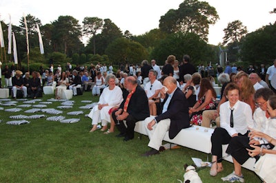 Guests, including Lou Reed, Fern Mallis, and Robert Wilson, were encouraged to wear black-and-white outfits, matching the two-tone color palette of the decor.