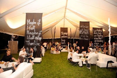 As a nod to Anderson, large black scrims in the tented lounge displayed lyrics from her songs, including 'Falling,' 'Strange Perfumes,' and 'Thinking of You.'