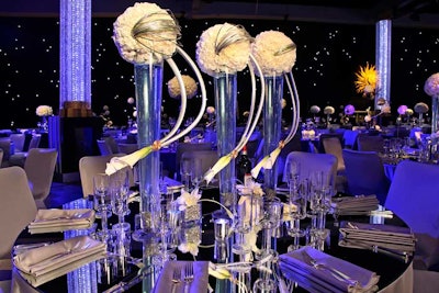 La Premier supplied the spherical white flower arrangements.