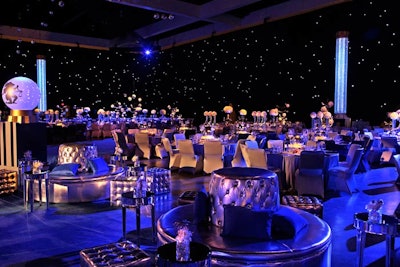 About 3,000 smaller mirror balls hung from the ceiling, creating the look of vast open skies.