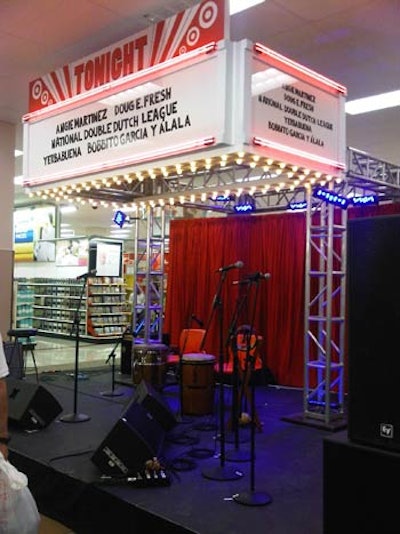 In the middle of the store, next to the bar, Target constructed an Apollo Theater-inspired stage on which a series of performances from noted Harlem entertainers like Doug E. Fresh took place during the Tuesday-night event.