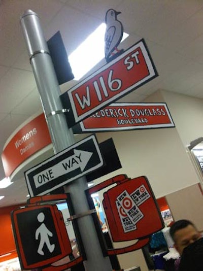 Ten street signs, each 10 feet tall and made of PVC pipe with a weighted wooden base, were placed throughout the 136,000-square-foot store to emphasize the neighborhood's iconic streets. Illustrator Bill Brown's art for Target's campaign was painstakingly hand-drawn, sketched, and scanned in for each sign.