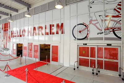 The main entrance to the store was marked with signage that read 'Hello Harlem' and Bill Brown's cheeky illustrations for the advertising campaign. The large-format installation comprised 30 to 40 panels placed over the glass facade on a customized grid.