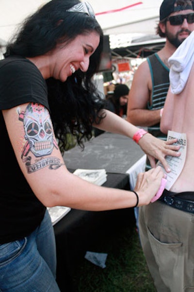 Upcoming movie The Expendables sponsored a tent that provided free temporary tattoos.