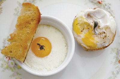 Eggs en cocotte with shallot cream, prosciutto, and polenta