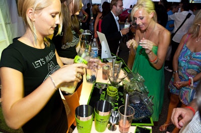 Patron hosted bars inside and outside the tent, with signature lime-green branding and fruit-flavored cocktails.