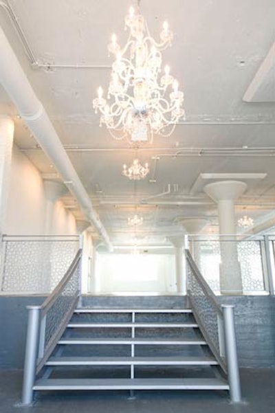 Crystal chandeliers hang from the ceiling of Aérée Loft.