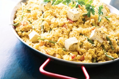 Vegetable paella with saffron-scented rice, tofu, and vegetables, from Contemporary Catering in Los Angeles.