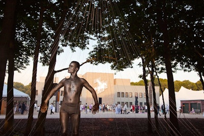 Artists Shige Moriya and Ximena Garnica's 'Angelus' combined a live performance with an installation: gold- and silver-painted performers moved in and around a string sculpture and cocoons.