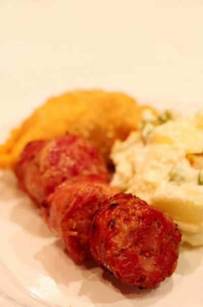 Chef Miguel DeMarziani of Rincon Argentino offered grilled chorizo accompanied by a beef empanada and potato salad.