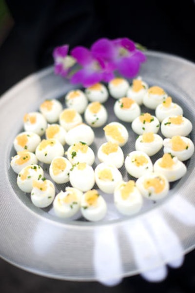 Jewell Events Catering passed hors d'oeuvres including quail eggs with creme fraîche and caviar.