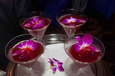 The Harlequin Heartbreak cocktail was a mix of X-Rated Vodka, Chambord, and pineapple juice, topped with an edible orchid.