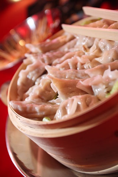 Restaurant Associates served pork dumplings with soy sauce.