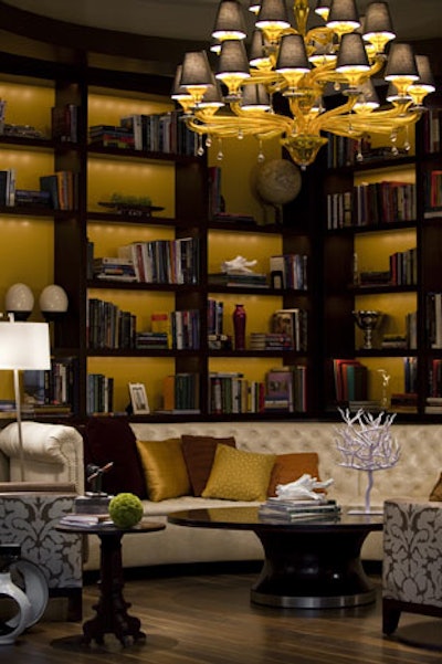 The lobby library, Explore, is adorned with a 24-arm Murano glass chandelier.