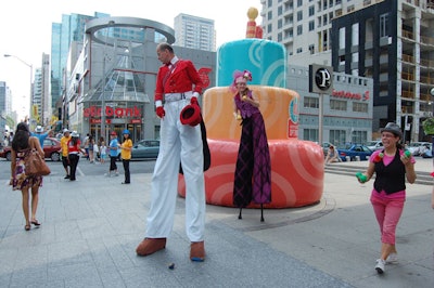 Buskers entertained passersby at the pop-up birthday party on Bloor Street.