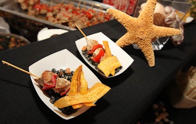 In the Caribbean tent, buffets offered jerk-chicken skewers with plantain chips. Seashells lent a festive ambiance.