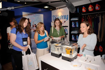 GES Exposition Services helped Procter & Gamble create its 'Home Away From Home' booth, which was divided into sections styled after rooms in a house. Each area was devoted to a handful of products, including Bounty, Swiffer, Pantene, Tide, Crest, and Olay.