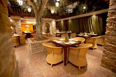 La Cucina's centrally located tree and stonework are reminiscent of a Tuscan courtyard.