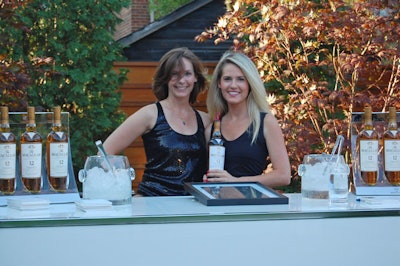 Brand ambassadors offered tastings of Macallan single malt Scotch whisky at a bar in the backyard.