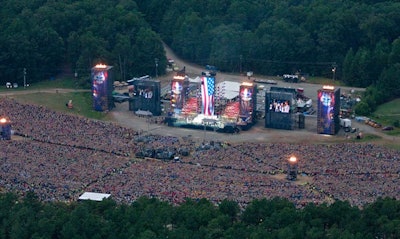 The massive stage structure took 21 days to build and stretched 395 feet from tower to tower.