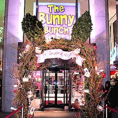 DeJuan Stroud created a bunny head-shaped trellis wrapped in vines and flowers, with Easter baskets and other decorations placed around it outside the entrance of FAO Schwarz.