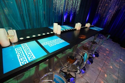 Frost designed the American Express lounge, which incorporated the company's signature blue and had 'a forest-like, Avatar feel,' Remer said.