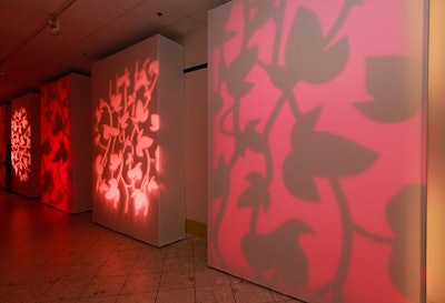 In each space, video elements were projected onto walls to set the tone and theme of that area.