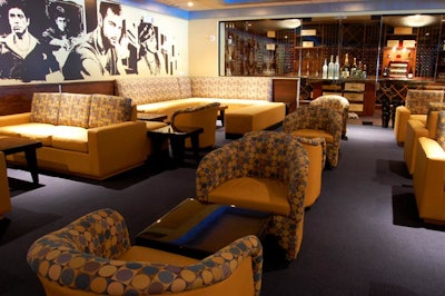 Black and white images from Miami movies like Scarface and Miami Vice decorate the walls of lounge area.