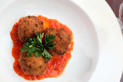 Guests tasted lobster fritters and a glass of red sangria at Pienza Italian Market