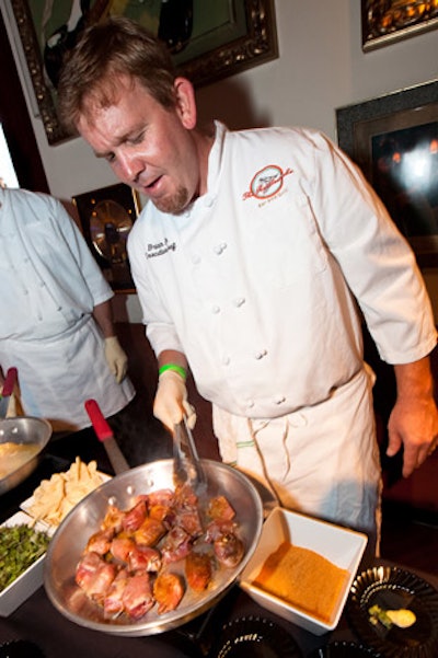 Chef Brian Poe of event sponsor Poe's Kitchen at the Rattlesnake cooked for guests at the V.I.P. reception.