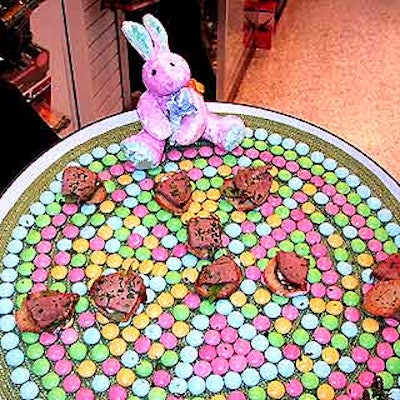Party Box's trays of filet on crostini featured a mosaic of pastel-colored M&M's with a plush velvet bunny on top.