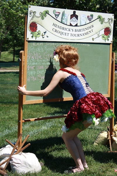 Staffers recorded croquet scores on a branded chalkboard.