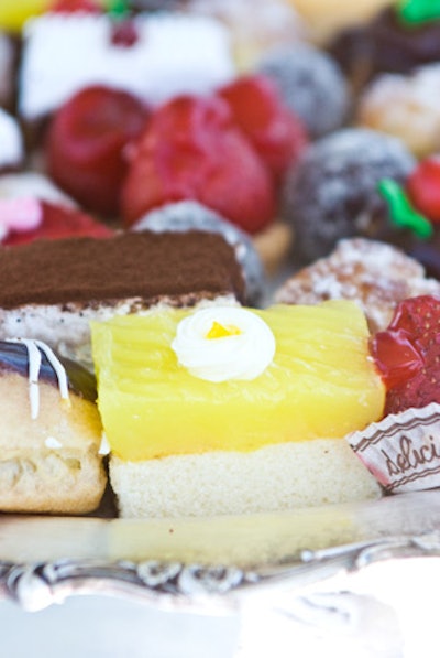 Prime Food Caterers provided mini sweets such as caramel tarts, cream puffs, and lemon bars.