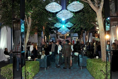 Clusters of chandeliers ran the length of the courtyard.