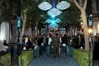 Clusters of chandeliers ran the length of the courtyard.