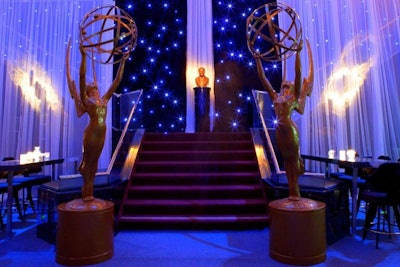 Black drapery decorated with sparkling lights hanging inside the theater helped evoke the 2010 official Emmy key art's 'starry, starry night' theme.