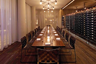 At RH, bottles line the walls of a private space known as the wine gallery.