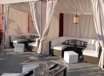 The outside space includes cabanas and a view of the Promenade.