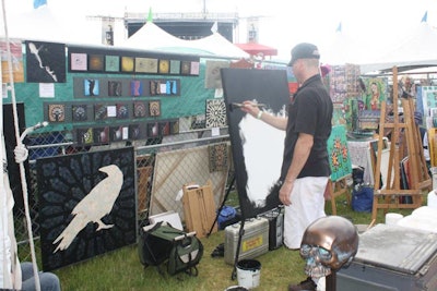 Nearly 30 local artists, many of whom created works on-site, set up their wares in the Artist Compound between the two stages.