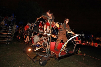 During the performance, the Bibi character played drums atop a wheeled Redmoon machine.
